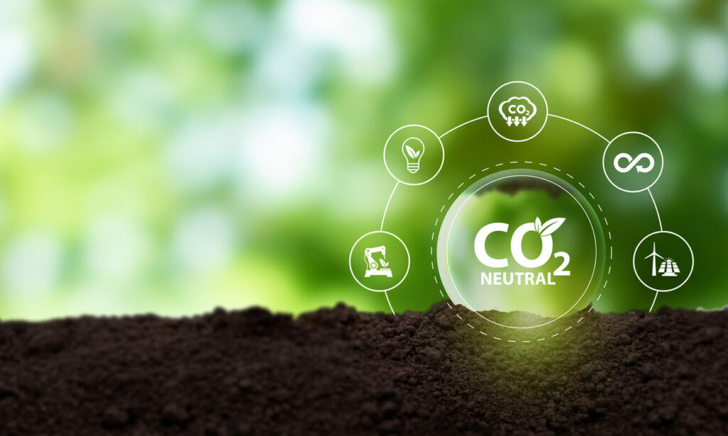 Carbon neutral sustainable development concept. Green industry. Climate neutral long term strategy. Carbon neutral symbols on green view background. How To Reduce the Carbon Impact of Food Production.